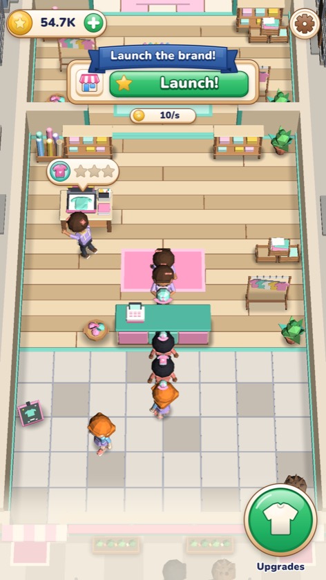 Game screenshot: a bright fashion shop where customers queue at the till, with a green Launch the brand button on top.